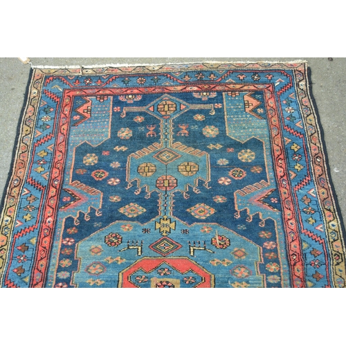 28 - Hamadan rug with a lobed medallion design on blue ground with borders, 6ft 3ins x 4ft 2ins (slight w... 