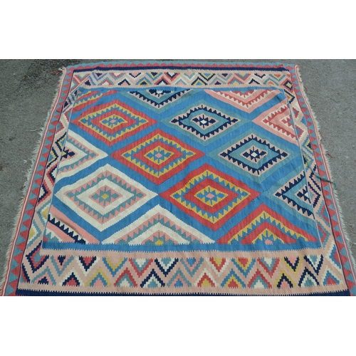 30 - Small kelim rug with an all-over polychrome diamond design with borders, 4ft 10ins x 4ft 10ins appro... 