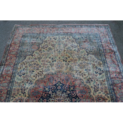 34 - Indo Persian rug with a medallion and all-over stylised floral design in shades of deep blue, pink a... 