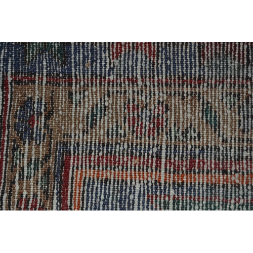 40 - Hamadan rug with a lobed medallion design on a wine red ground with border designs, 6ft 10ins x 4ft ... 