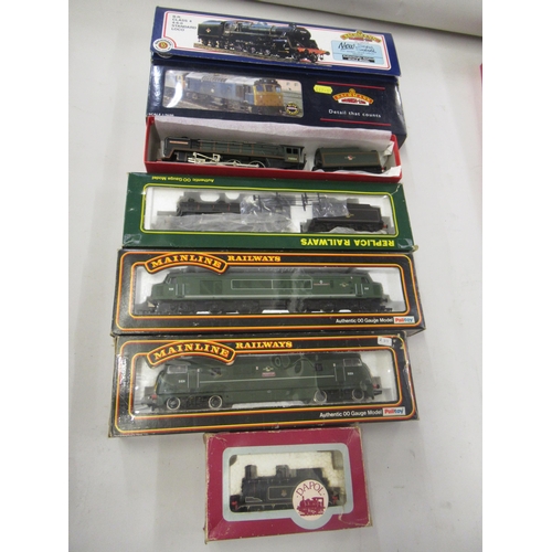403 - Bachmann 00 gauge locomotive and tender, BR Class 4 Standard, together with a similar diesel locomot... 