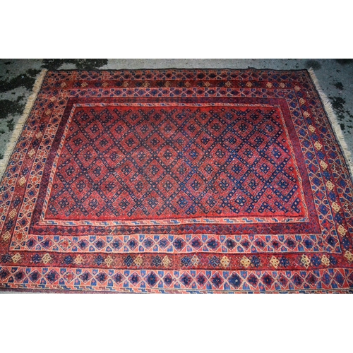 44 - Belouch rug having central repeating diamond design with multiple borders, 200 x 153cms