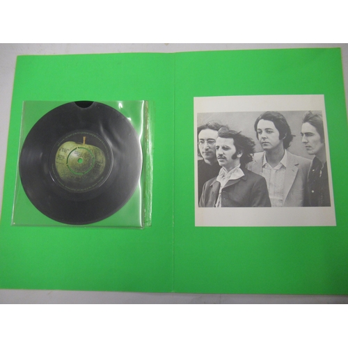 441 - Apple Records Limited, promotional folder ' Our First Four ' containing four single records, The Bea... 