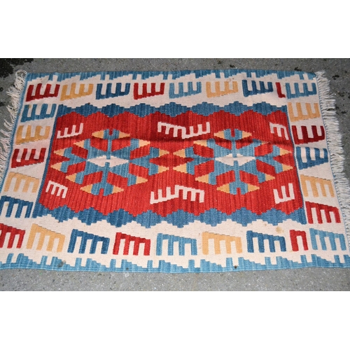 45 - Kelim rug having red, blue and cream ground and another similar, smaller, 160 x 110cms and 120 x 82c... 