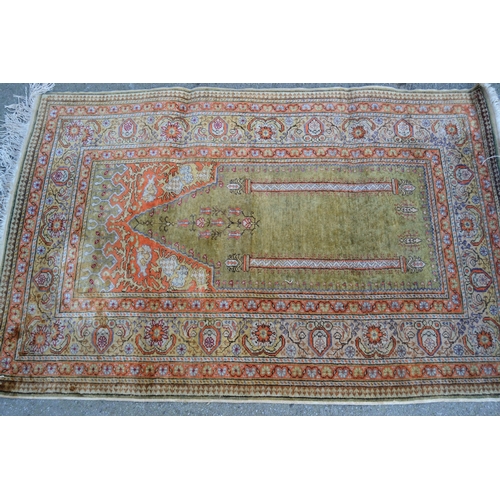 48 - Turkish part silk prayer rug, the centre panel with multiple borders, 55ins x 36ins