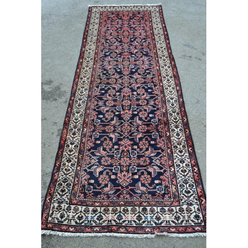 51 - Modern Hamadan runner with an all-over Herati design on a midnight blue ground with borders, 9ft 4in... 