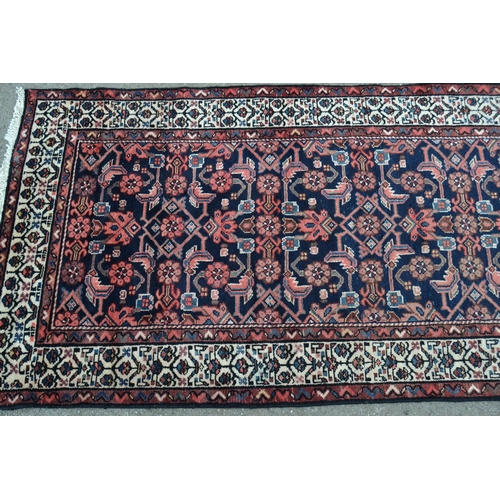 51 - Modern Hamadan runner with an all-over Herati design on a midnight blue ground with borders, 9ft 4in... 