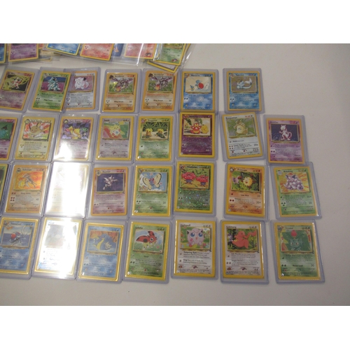 517 - Box containing a large quantity of Pokemon cards including Base set, Jungle, Fossil and Team Rocket ... 