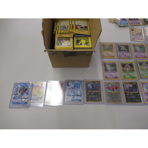 517 - Box containing a large quantity of Pokemon cards including Base set, Jungle, Fossil and Team Rocket ... 