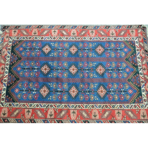 52 - Modern Belouch design carpet with a triple hooked panel design on a blue ground with multiple border... 