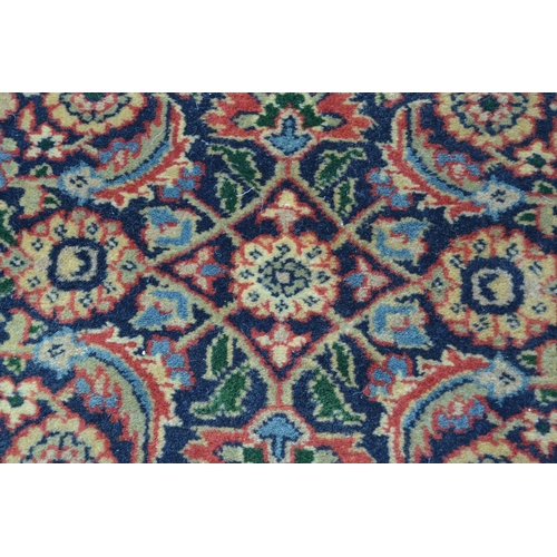 61 - Indo Persian rug with an all-over Herati design on a midnight blue ground with brick red borders, 8f... 