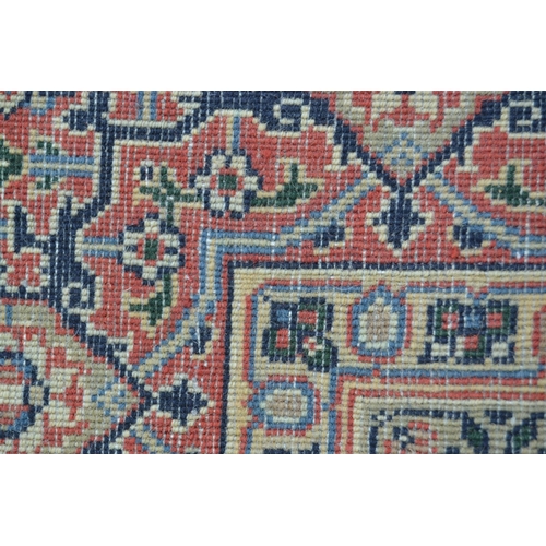 61 - Indo Persian rug with an all-over Herati design on a midnight blue ground with brick red borders, 8f... 