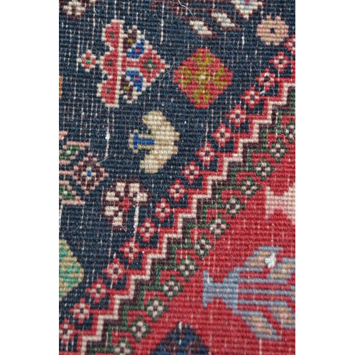 63 - Modern Persian rug of Qashqai design with a triple medallion and all-over floral pattern on a rose g... 
