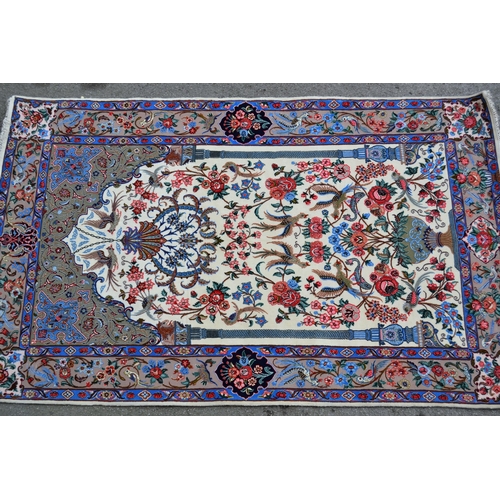 66 - Isfahan wool and silk prayer rug with a Mihrab bird and floral design on an ivory ground with corner... 