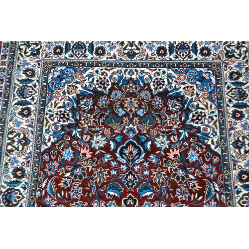 71 - Small modern Persian silk rug with a lobed medallion and all-over stylised floral design on a rust g... 