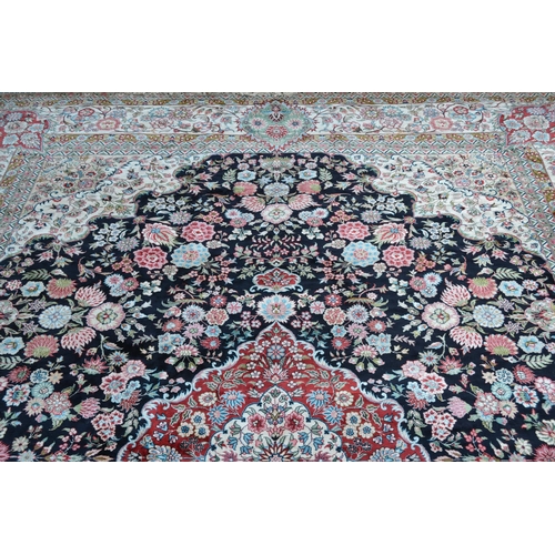 73 - Fine quality modern Persian silk carpet with a lobed medallion and all-over stylised floral design o... 