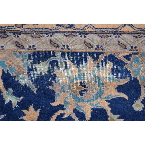 75 - Sparta carpet with an all-over palmette design on a midnight blue ground with borders, 12ft x 9ft ap... 