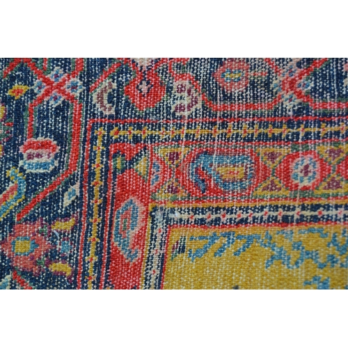 79 - Unusual Abadeh rug with a stylised floral design on a yellow ground with borders, 4ft 6ins x 3ft 8in... 