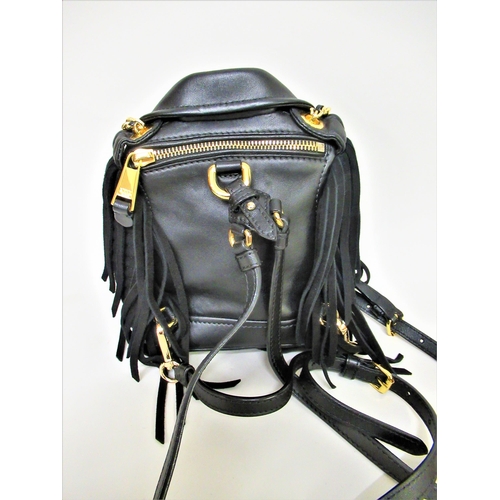 89 - Moschino, mini biker jacket black leather backpack / mini handbag having gold tone hardware