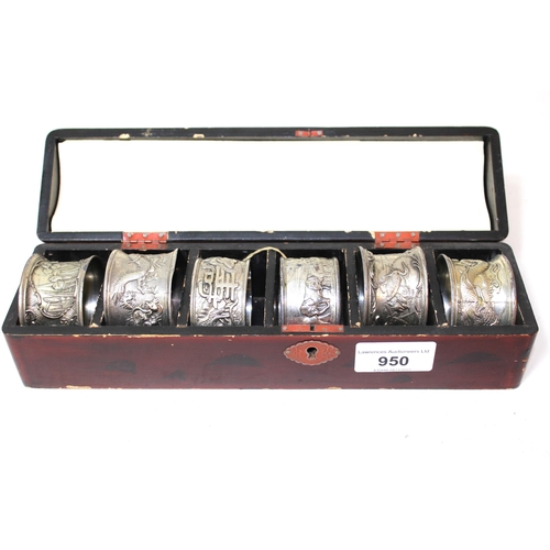 950 - Group of six Japanese silvered metal napkin rings, housed in a lacquer case with divided interior