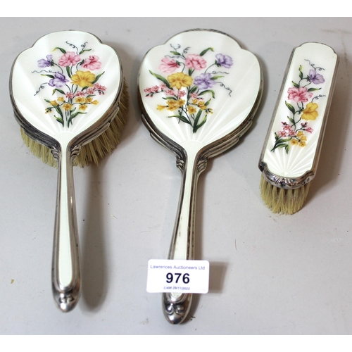 976 - Birmingham silver and floral decorated translucent enamel three piece dressing table set