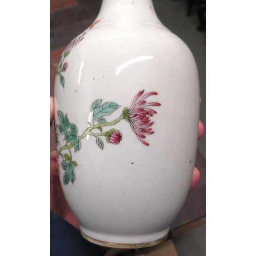 579 - Small Chinese famille rose baluster form vase decorated with flowers and trees, red seal mark to bas... 