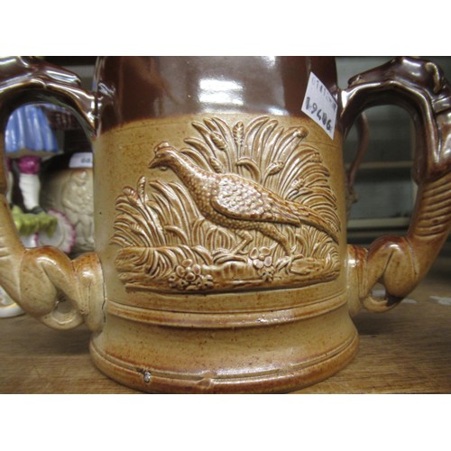 683 - 19th Century salt glazed mug with relief moulded animal decoration and three greyhound handles, 5ins... 