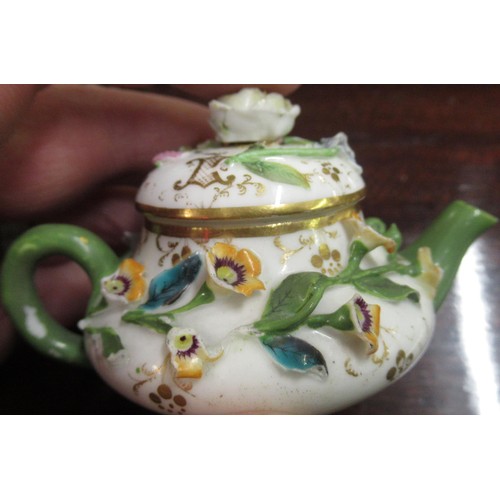 719 - Duesbury Derby miniature floral encrusted sander, together with another similar, painted with a land... 