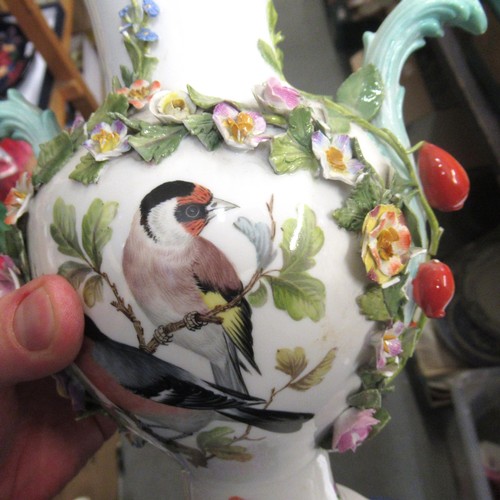 885 - Pair of 20th Century Meissen two handled vases painted with flowers, 10ins high (with damages)