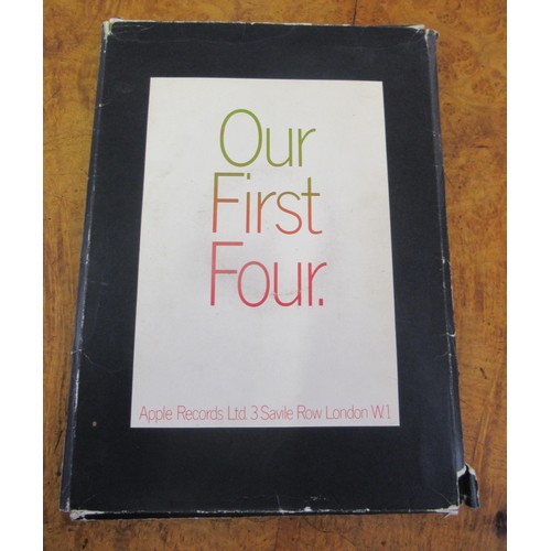 441 - Apple Records Limited, promotional folder ' Our First Four ' containing four single records, The Bea... 