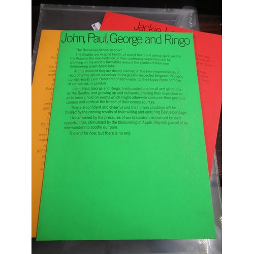 441 - Apple Records Limited, promotional folder ' Our First Four ' containing four single records, The Bea... 