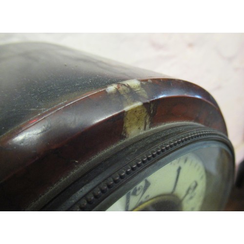 1920 - Large 19th Century black slate and rouge marble mantel clock, the enamel chapter ring with Arabic nu... 