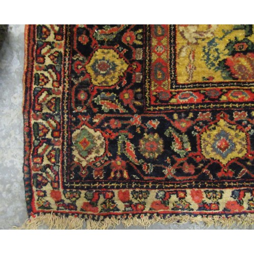 79 - Unusual Abadeh rug with a stylised floral design on a yellow ground with borders, 4ft 6ins x 3ft 8in... 