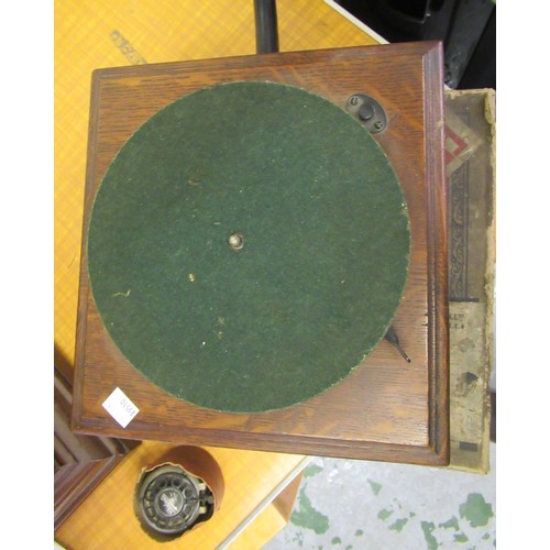 444 - Late 19th / early 20th Century oak cased table model gramophone, with green painted horn by The Gram... 