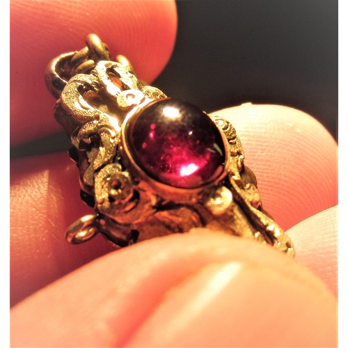 1357 - Victorian 15ct gold bracelet, the clasp set with a cabochon garnet,10.5g