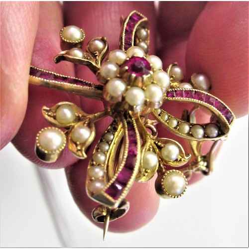 1356 - Edwardian 15ct gold brooch set rubies and pearls suspended from a 9ct gold chain interspaced with pe... 