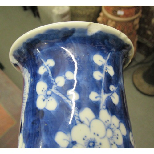 616 - Chinese blue and white prunus blossom flared rim cylindrical vase having four character marks to the... 