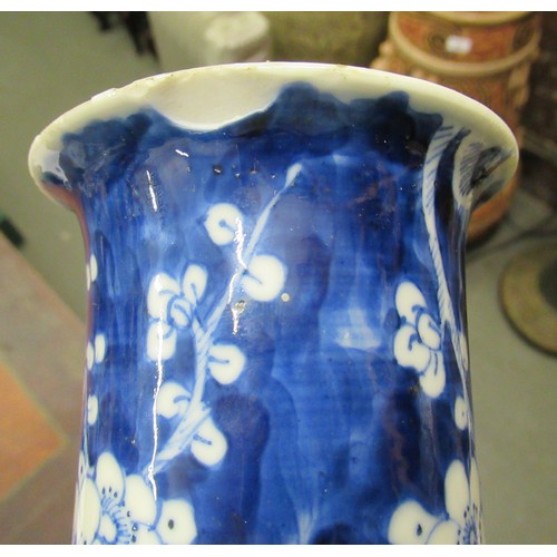 616 - Chinese blue and white prunus blossom flared rim cylindrical vase having four character marks to the... 