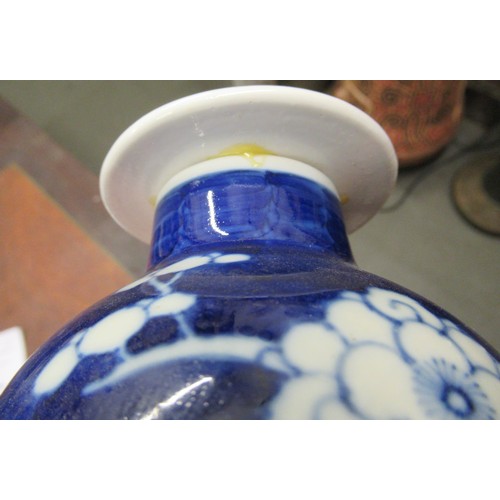 616 - Chinese blue and white prunus blossom flared rim cylindrical vase having four character marks to the... 