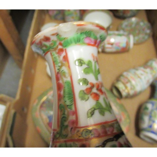 686 - Two boxes containing a large collection of various Chinese porcelain boxes, vases, teacups, teapots ... 