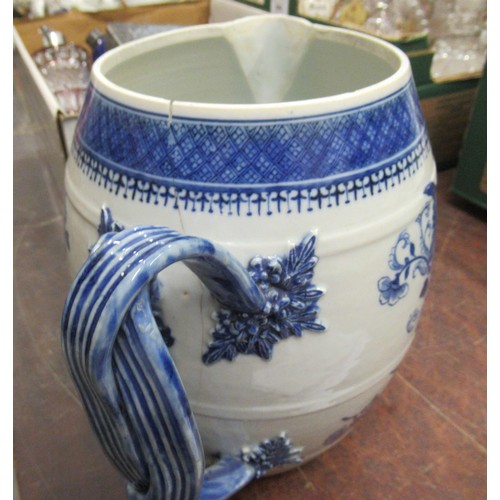 722 - Large 18th Century Chinese export blue and white barrel form jug, (at fault) 8.5ins high