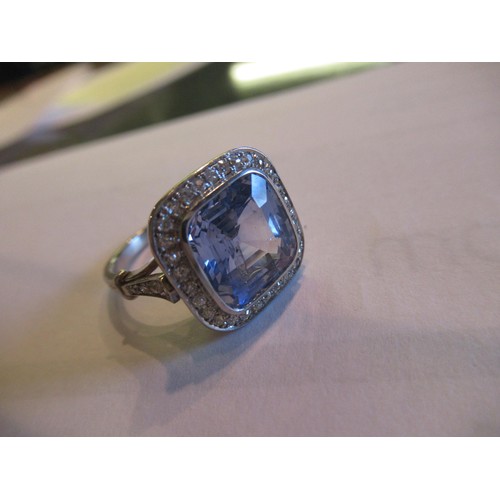 1126 - Cornflower blue natural Ceylon sapphire ring, the cushion shaped centre stone of approximately 8.47c... 