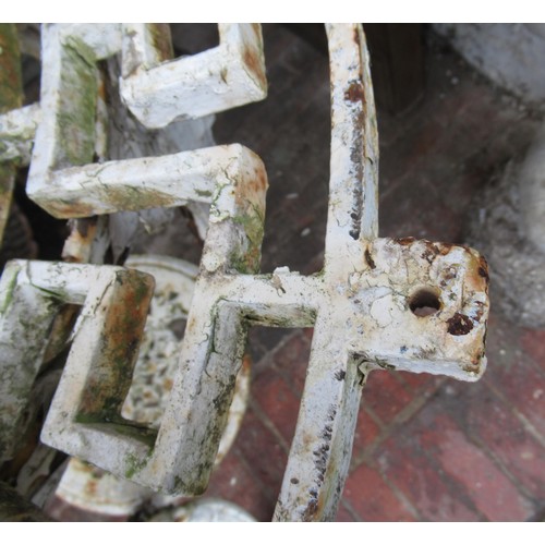 2322 - White painted cast iron pub table base with an associated cast iron top