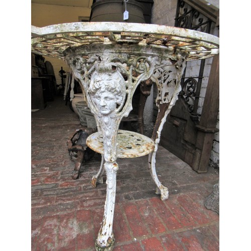 2322 - White painted cast iron pub table base with an associated cast iron top