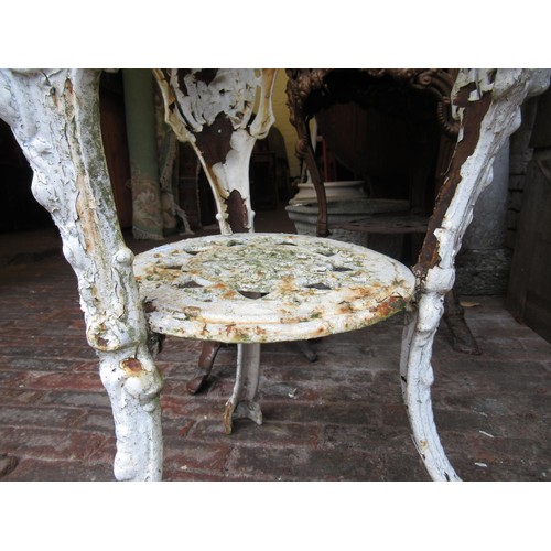 2322 - White painted cast iron pub table base with an associated cast iron top