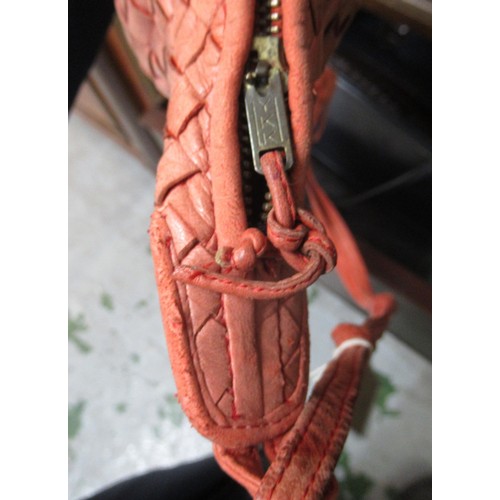 127 - Bottega Veneta, Hobo bag with knotted shoulder strap, Pierre Cardin black and white shoulder bag and... 