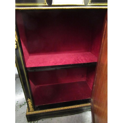 2313 - 19th Century ebonised and ormolu mounted single door pier cabinet inset with two Wedgwood blue jaspe... 