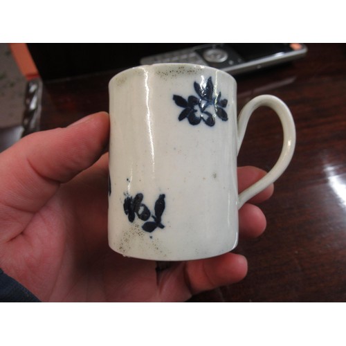 838 - Small 18th Century English mug, painted with flowers and a moth, 2.5ins high