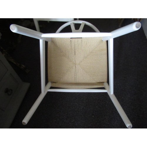 2309 - Pair of white lacquered wishbone type Charles Hansen style chairs with string seats, raised on turne... 