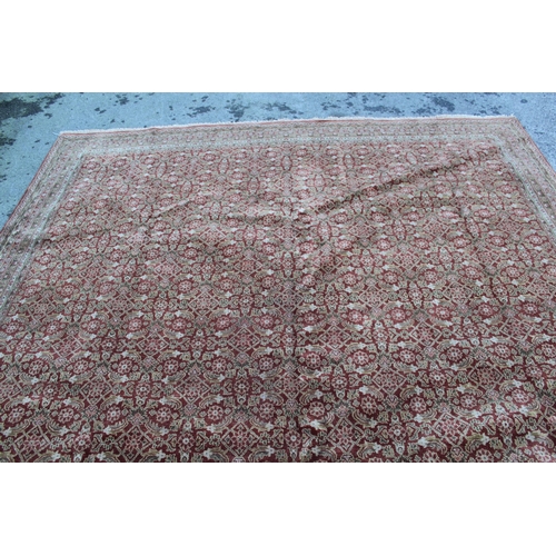 13 - Large Kashmir carpet with an all-over Herati design on a brick red ground with borders, 3.6m x 2.75m... 